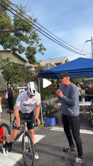 A Cycle Sport Specialized rider with a bike beside the announcer at the 2026 Berkeley Omnium