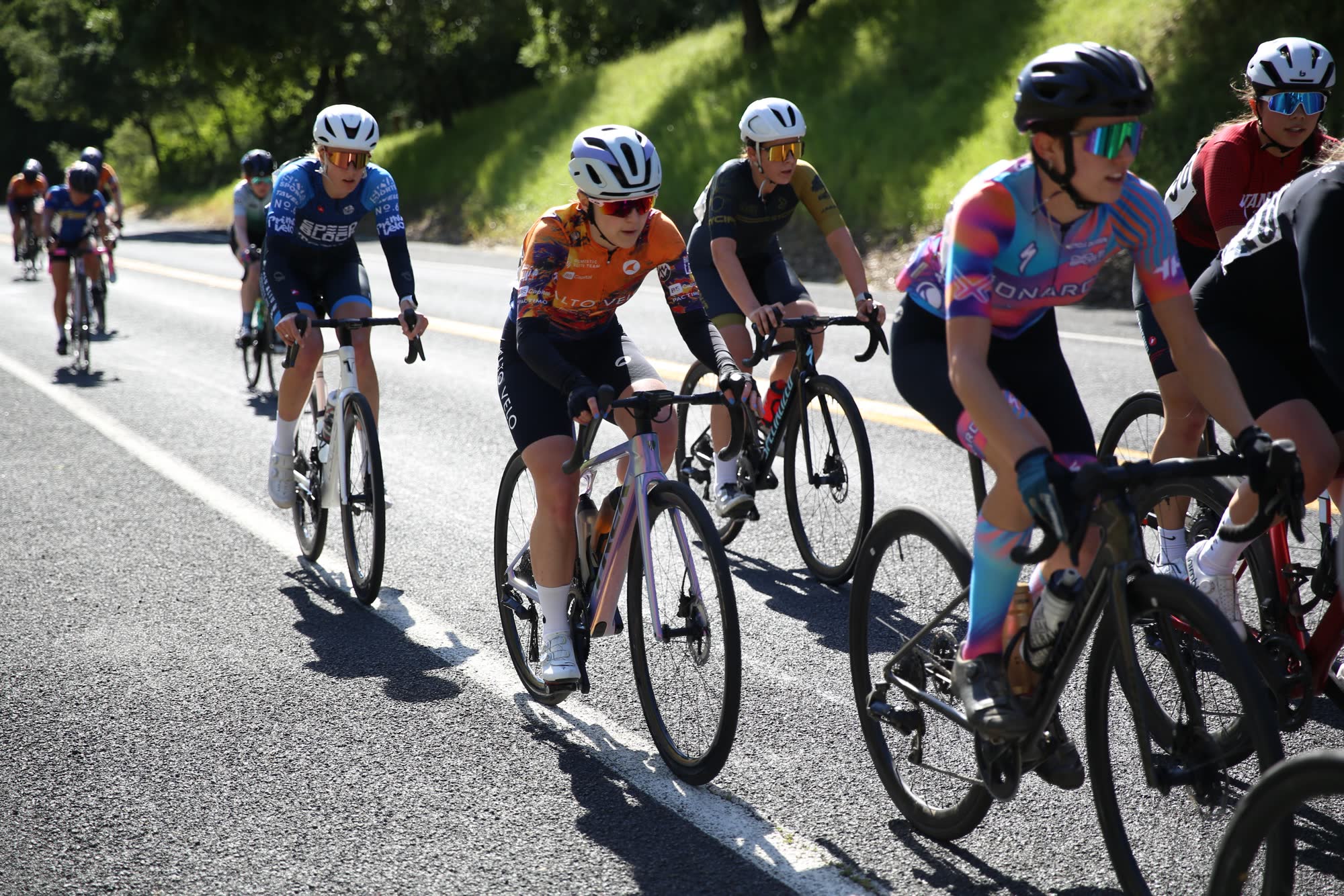 Riders in the lead group shoulder to shoulder on the Berkeley Hills Road Race course