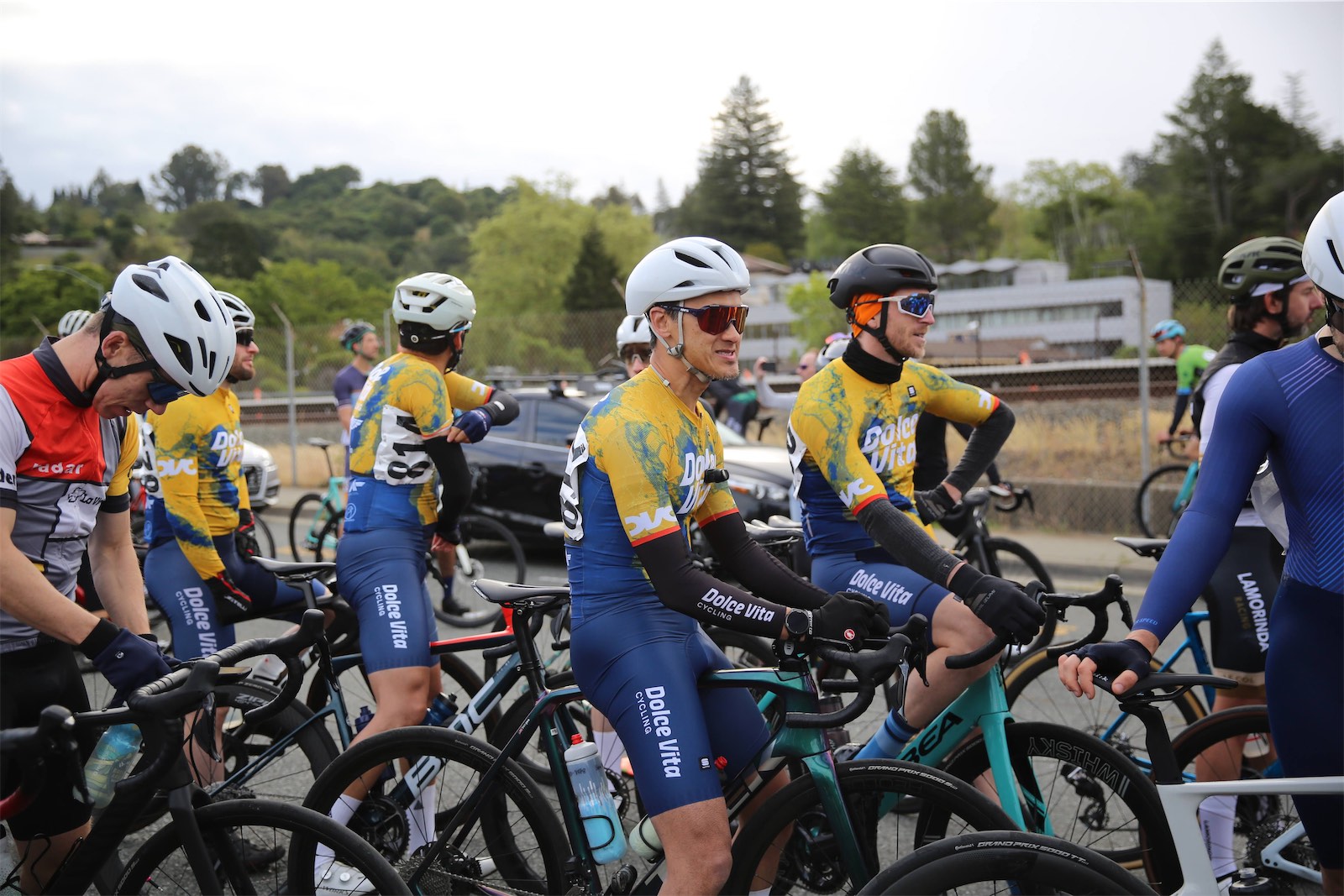 Dolce Vita Cycling riders in team kits among racers at the 2025 Berkeley Hills Road Race