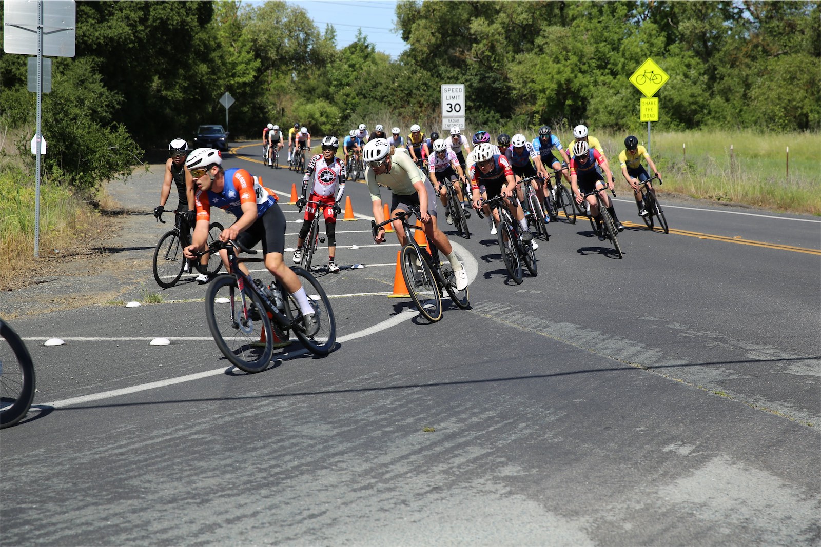 Riders on course at the 2026 Berkeley Hills Road Race, a Los Gatos Bicycle Racing Club racer among them